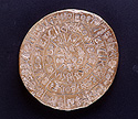 The Phaistos Disk. Clay disk. Probably 17th century B.C.