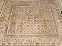 Floor with mosaic.