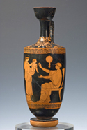 Red-Figure Lekythos. 470-460 B.C. From Eretria.
Athens, National Archaeological Museum, 1304
The seated woman stretches out her arms to receive the male child who is being held by a standing maidservant.