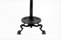 Bronze lamp bracket. Detail from the low part