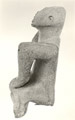 Side view of the figurine
