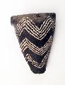 Leg of a neolithic miniature table with incised decoration