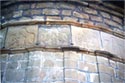 Stone reliefs in the apse with the date of rebuilding (1844)