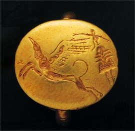 Golden ring with goddess ang griffin representation
