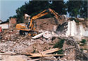 Destruction of old buildings during the discovery of the theatre