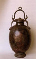 Urn in shape of an amphora with cover