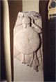 Grave stele of a helmeted warrior