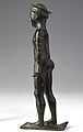 Side view of the figurine