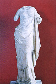 View of female statuette with ionic tunic
