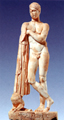 The statue of Podaleirios, son of Asklepios, with a dog at his feet