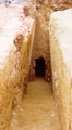 View of a rock-cut chamber tomb with dromos at Kydonia